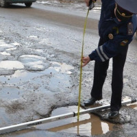 Можно ли получить компенсацию за попавший в аварию из-за дорожной ямы автомобиль?