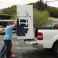 Как перевезти холодильник: можно ли перевозить его на боку?