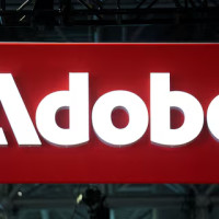 Компания Adobe согласилась выплатить 75 млн долларов и предложить услуги на такую же сумму для урегулирования претензий правительства США